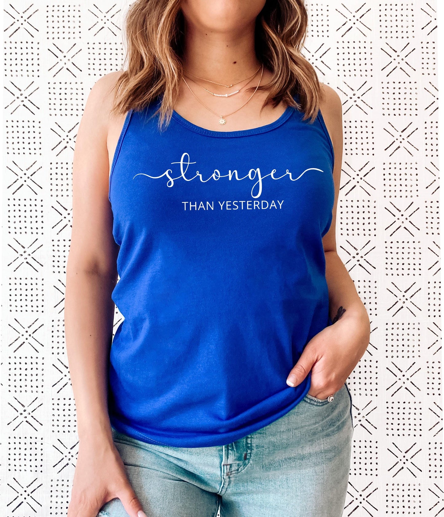 Empowering women's racerback tank top for strong, resilient and determined women in blue