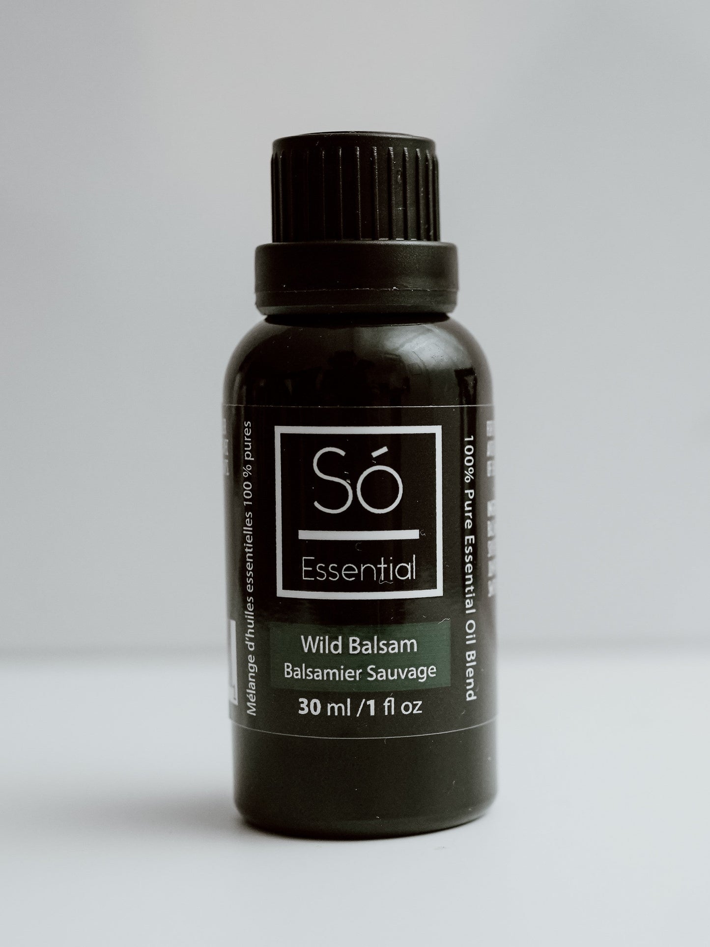 Wild Balsam essential oil bottle labeled 'Sö Essential' on a light gray background