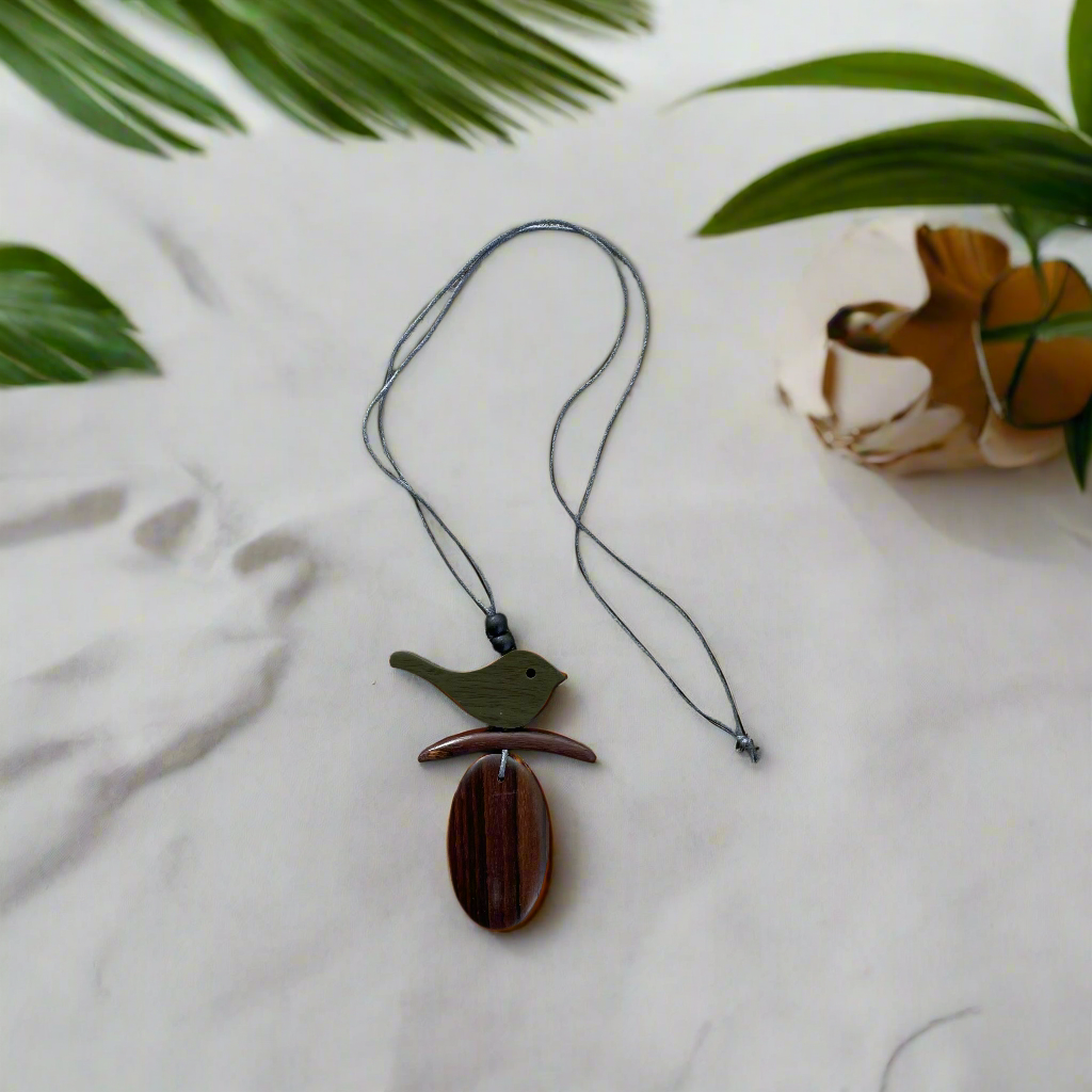Artisan wood bird charm necklace Bali nature jewelry