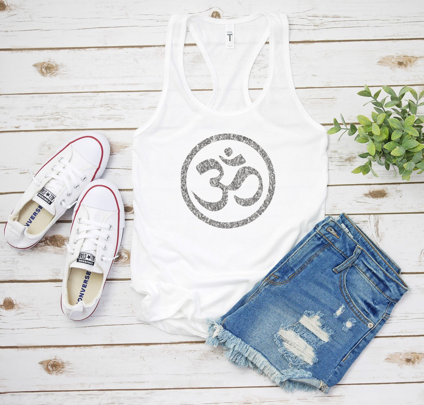 Shimmering Om symbol racerback tank top as a perfect gift for yoga enthusiasts in white