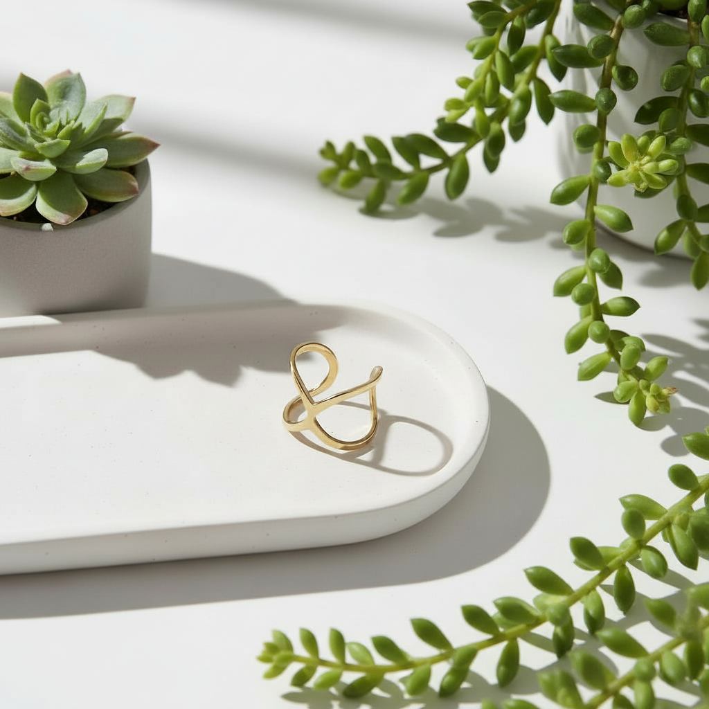 Handcrafted gold stainless steel X ring — minimalist bohemian jewelry from Bali