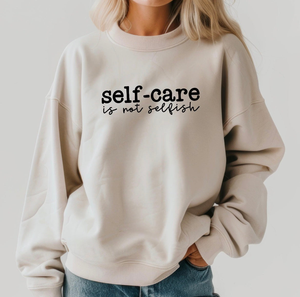 Affirming "Self Care Is Not Selfish" sweatshirt for women who honour their wellbeing beige