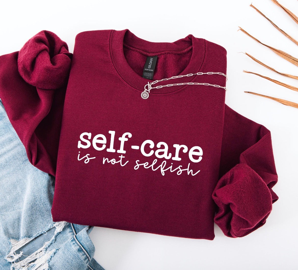 maroon women's self-care sweatshirt with empowering and honest affirmation graphic print
