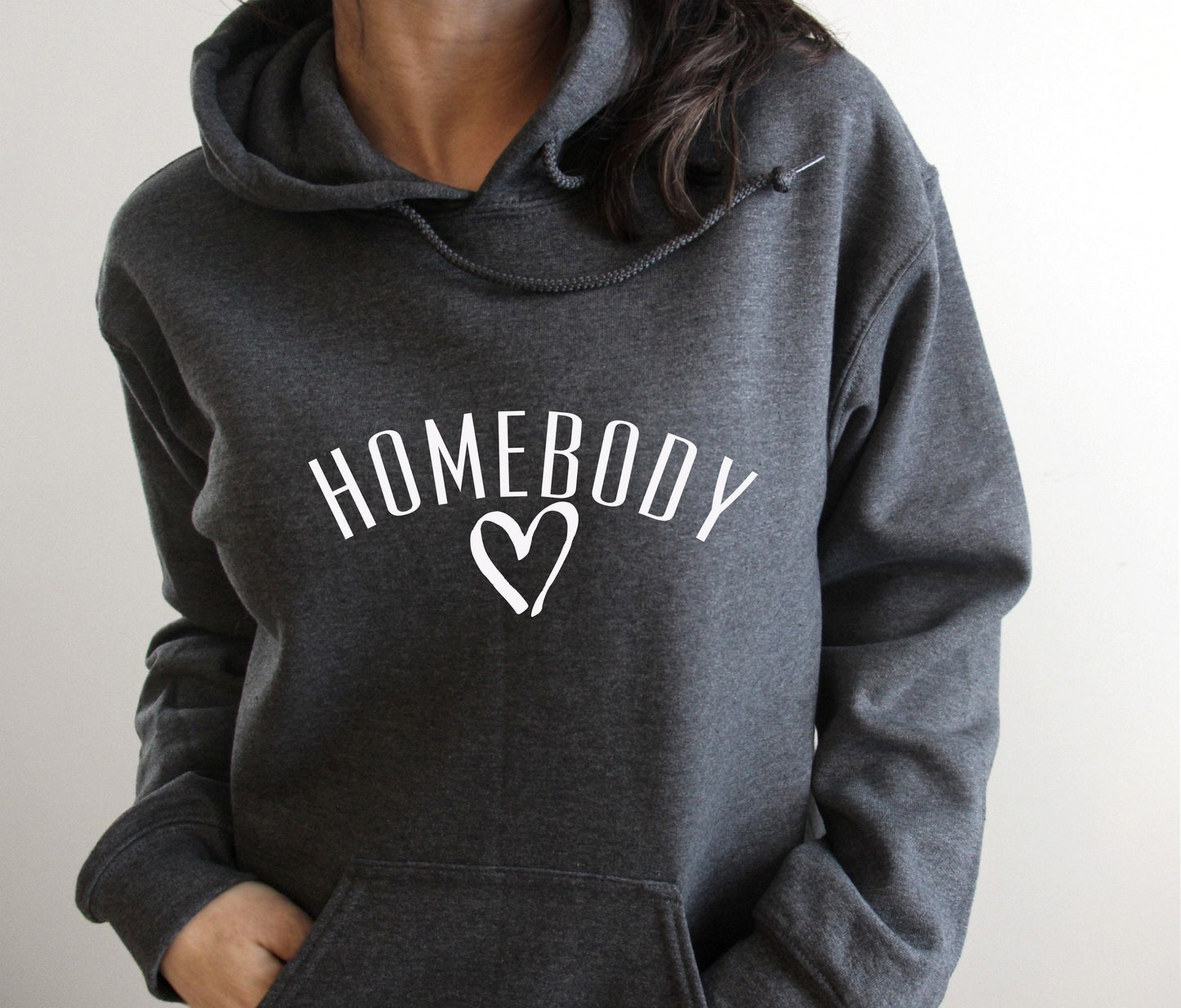 Cozy and relatable "Homebody" pullover hoodie for stay-at-home loving women in grey