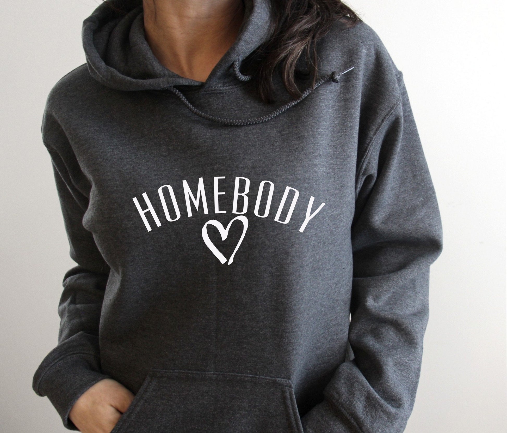 Cozy and relatable "Homebody" pullover hoodie for stay-at-home loving women in grey