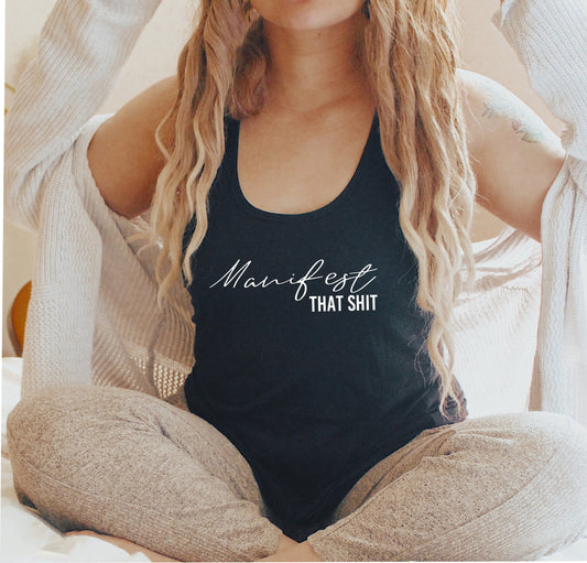 Bold and empowering "Manifest That Shit" racerback tank top for go-getter women in black
