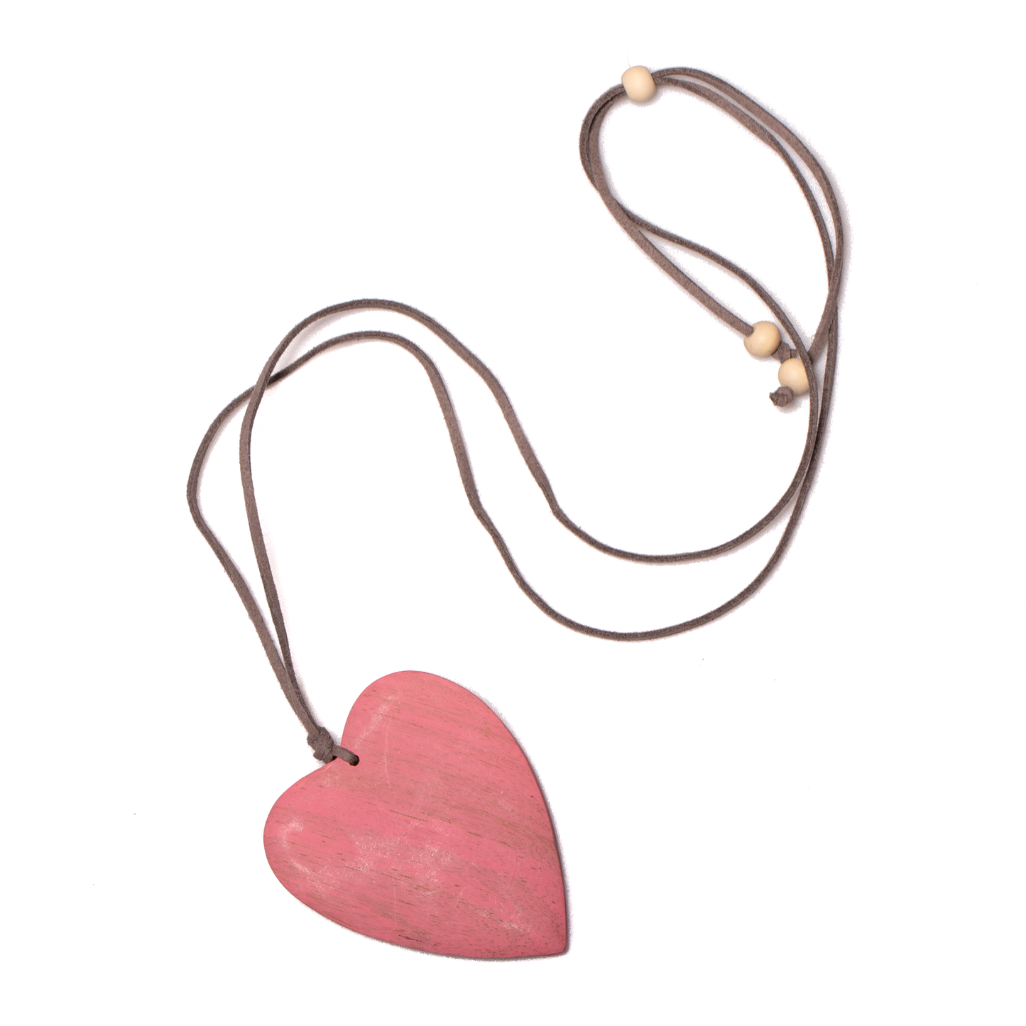 Pink tinted wood heart pendant — handcrafted natural wood necklace