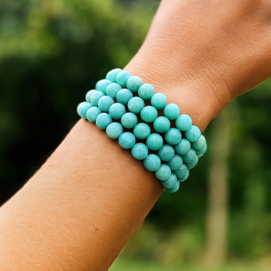 Amazonite gemstone bracelet display — teal crystal bead bracelet for truth, courage and communication