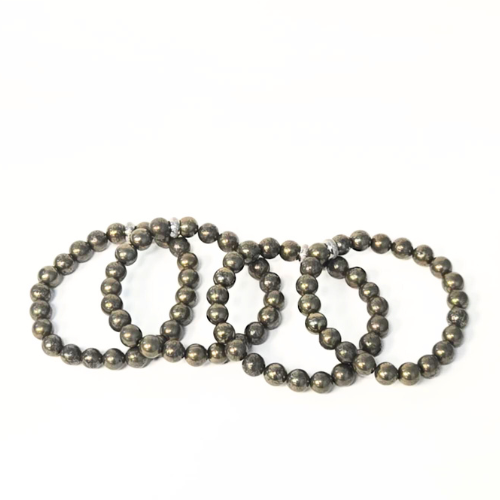Pyrite gemstone bracelet lifestyle — abundance and manifestation crystal bracelet for women