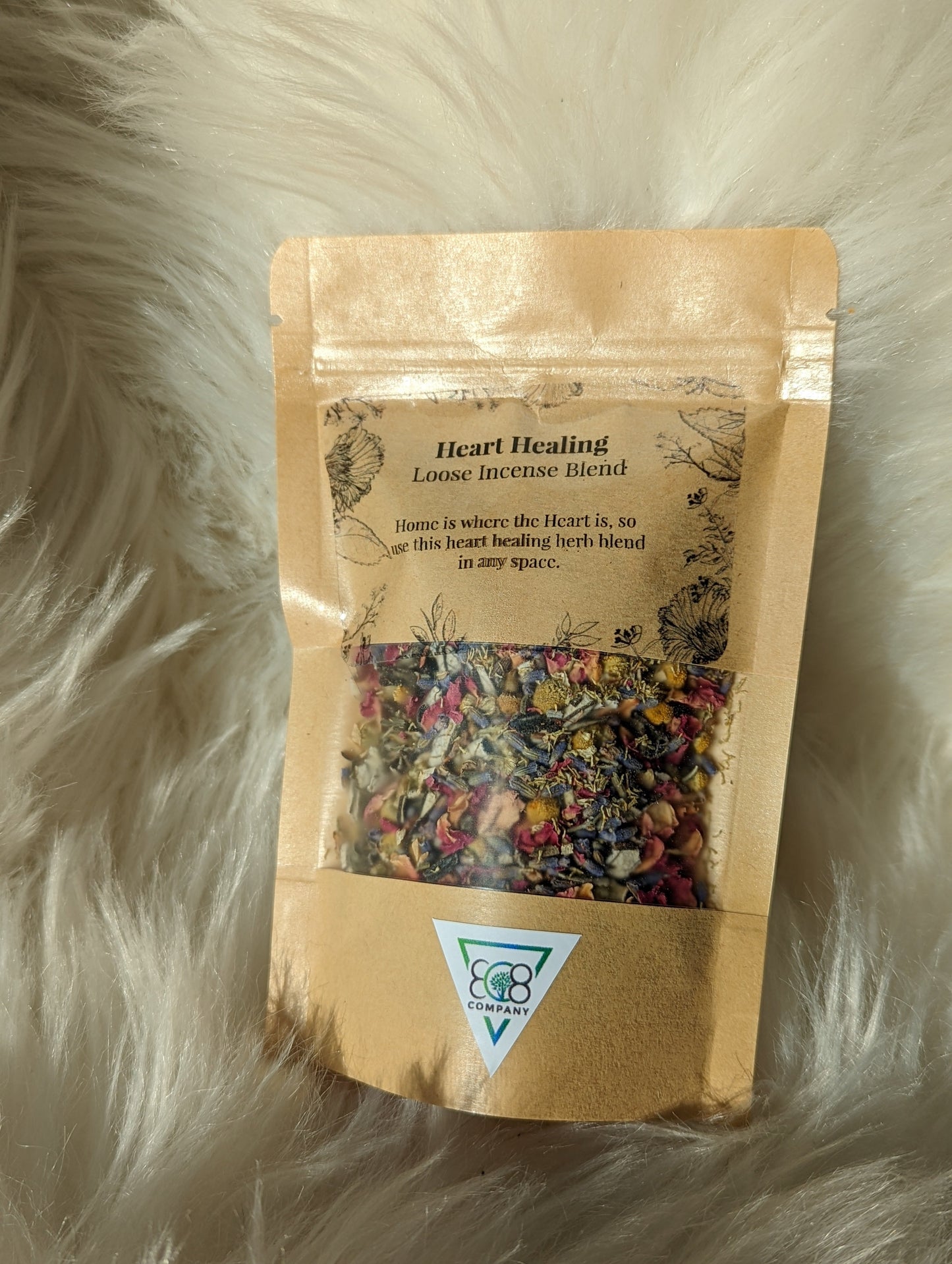 Heart healing loose incense close-up showing natural botanical herb blend detail