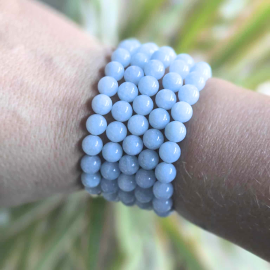 Chalcedony crystal bracelet close-up — soothing blue stone bracelet handcrafted in Canada