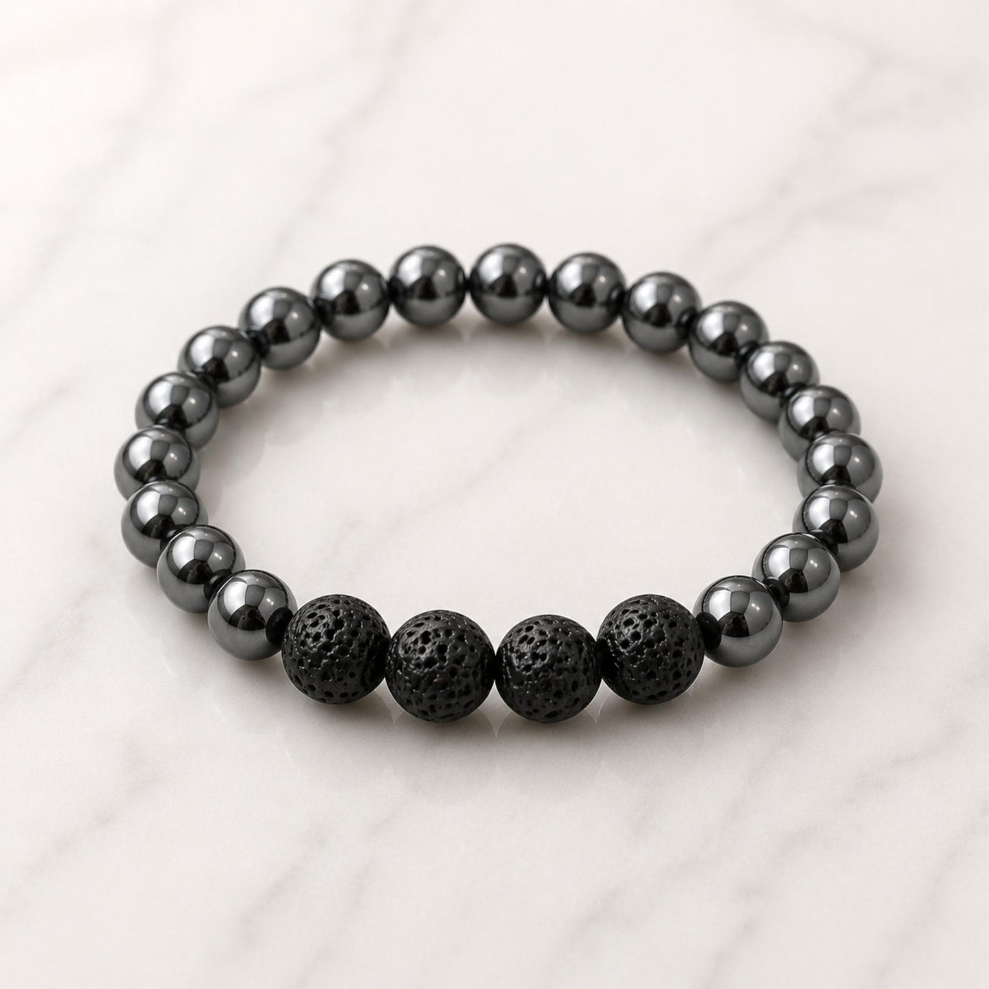 Handmade hematite and lava stone diffuser bracelet with lobster clasp — Reiki infused crystal jewelry for protection and grounding