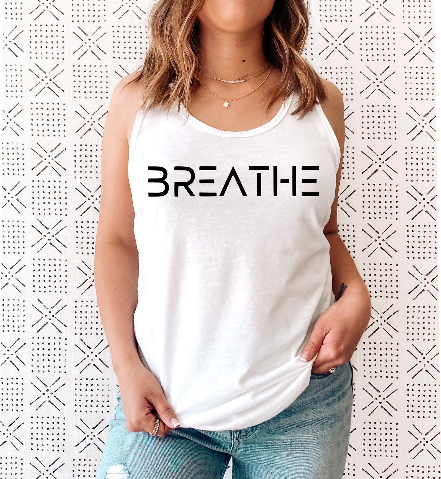 Calming and mindful "BREATHE" yoga tank top for present and grounded women in white