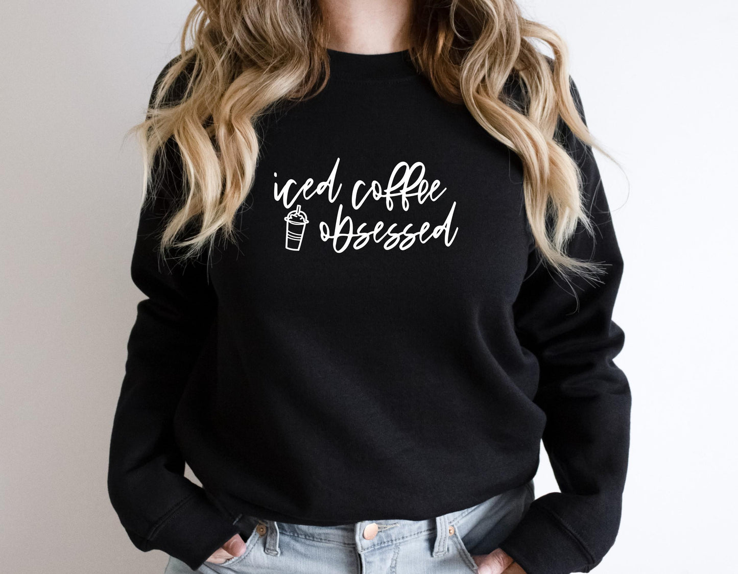 Women's funny iced coffee sweatshirt with bold and relatable graphic print in black