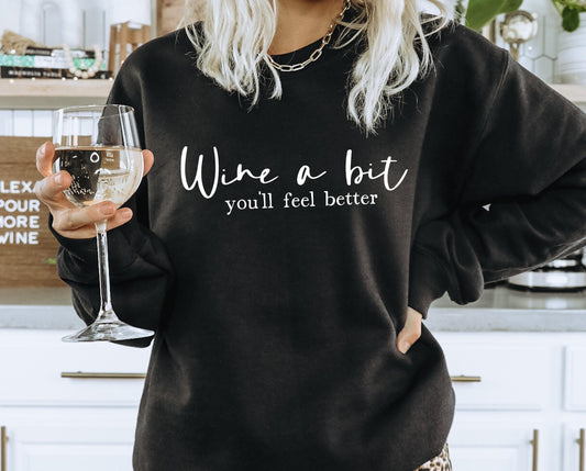 Humorous "Wine a Bit You'll Feel Better" sweatshirt for wine-loving women in black