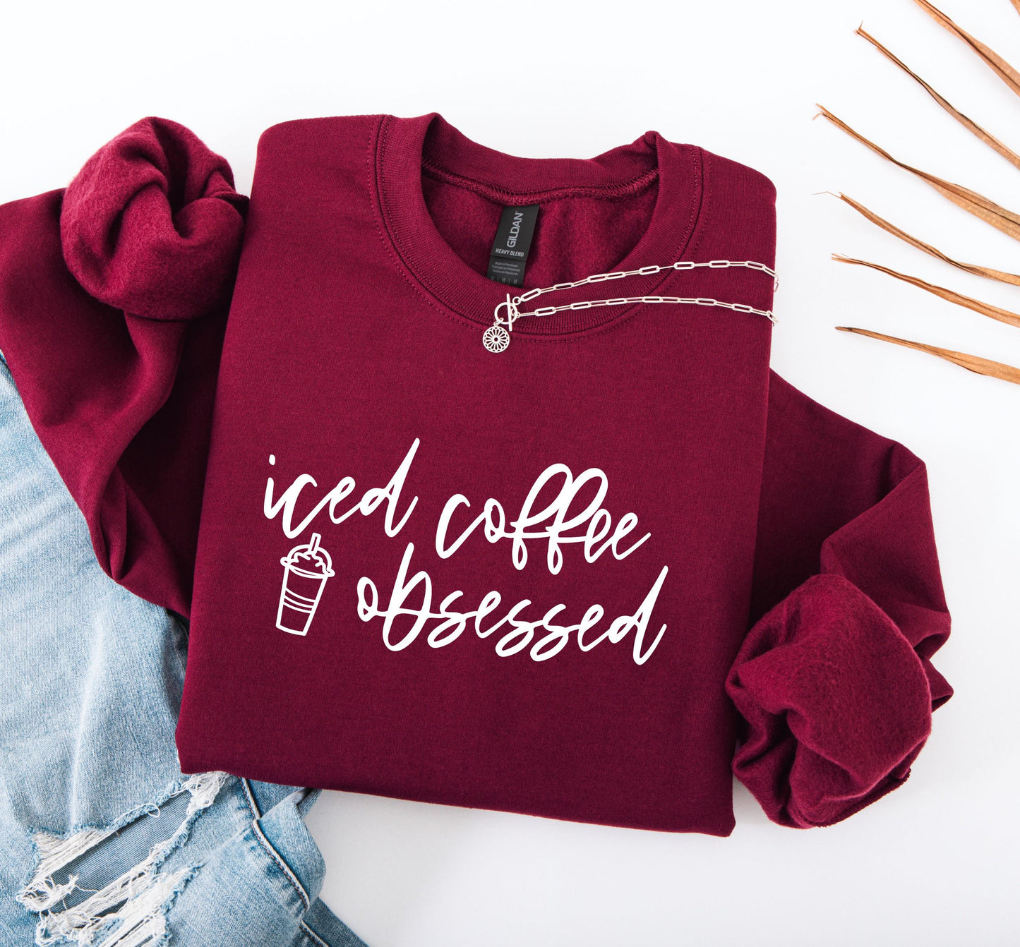 Funny iced coffee sweatshirt as a perfect gift for caffeine-obsessed women in maroon