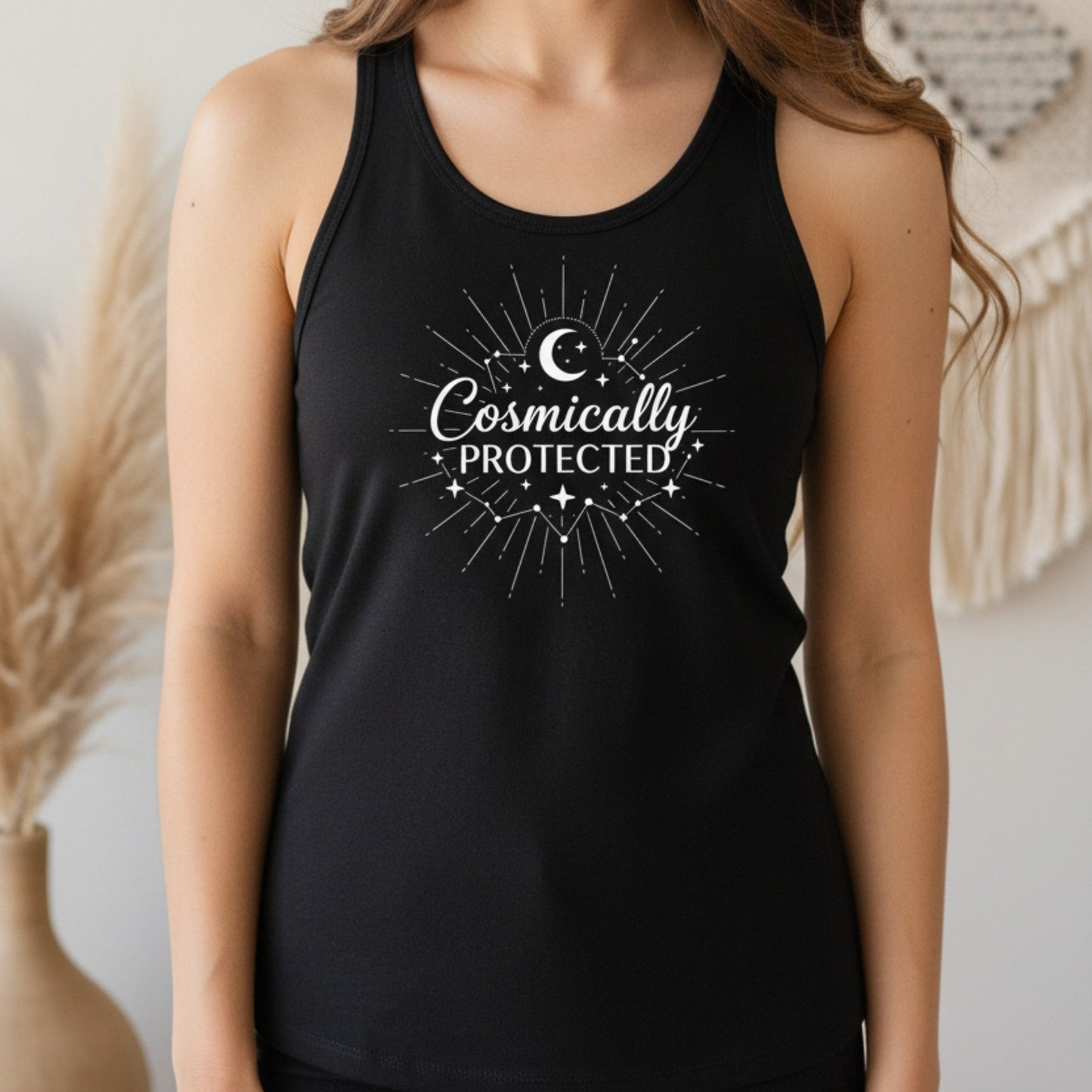 Black racerback tank with white crescent moon and sunburst print — witchy celestial yoga top for empaths and spiritual women who know they are never alone