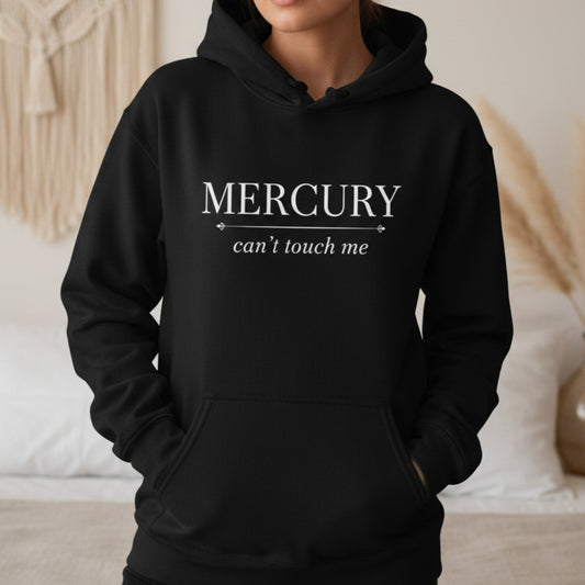 Black Mercury Can't Touch Me hoodie with white serif and script print — bold astrology gift for the grounded spiritual woman who moves through chaos with total calm