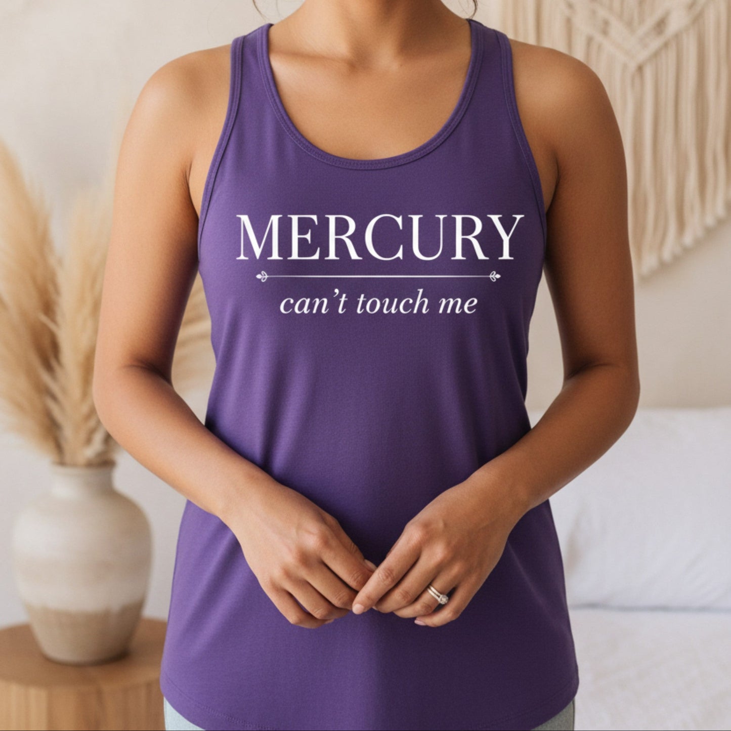 Purple Mercury Can't Touch Me racerback tank with white serif and script print — mystical astrology gift for the spiritual woman who thrives in every season the cosmos throws her way