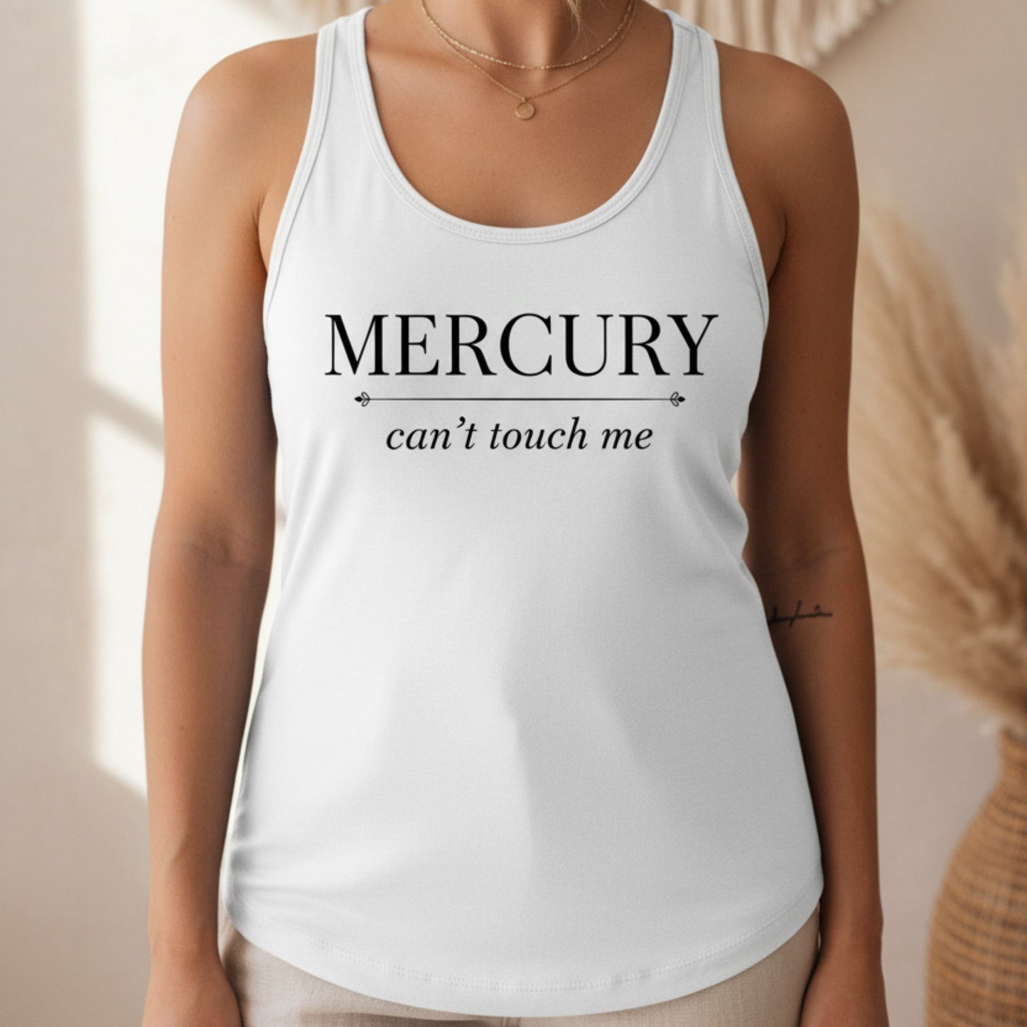 White Mercury Can't Touch Me racerback tank with black serif and script print — clean minimal astrology tank for the woman who keeps her energy high all retrograde long