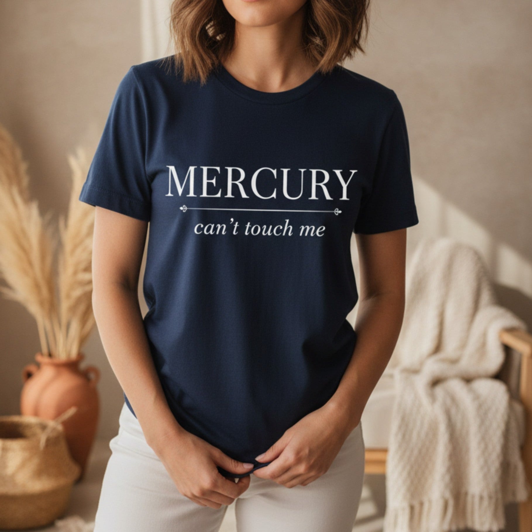 Navy Mercury Can't Touch Me tee with white serif and script astrology print — witty retrograde gift for the spiritual woman who stays grounded no matter what Mercury is doing
