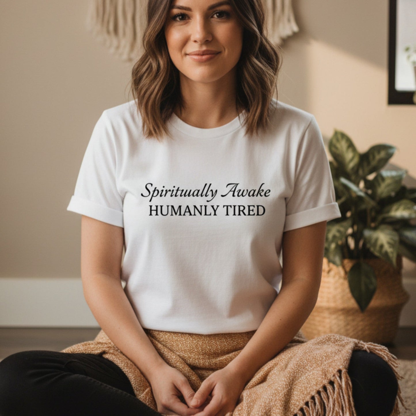 White Spiritually Awake Humanly Tired graphic tee with black script and serif print — clean minimal funny spiritual gift for the yogi who is doing the work and also very, very tired