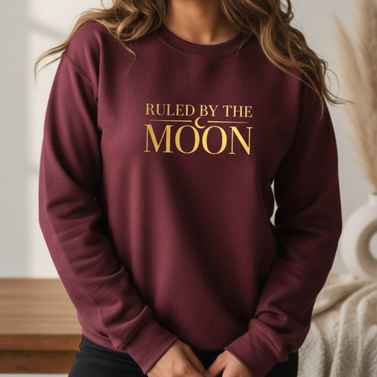 Maroon crewneck sweatshirt with gold crescent moon print — lunar cycle gift for the woman who sets intentions and trusts her intuition