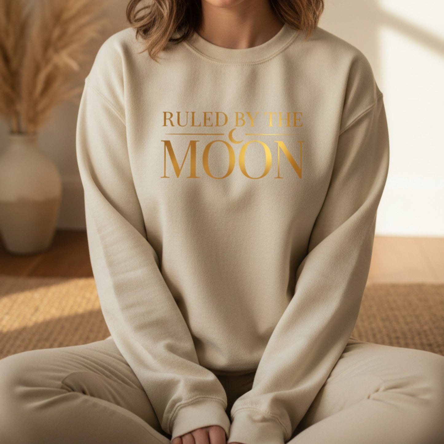 Sand neutral crewneck with gold celestial design — earthy moon lover sweatshirt perfect for gifting to the cosmic woman in your life
