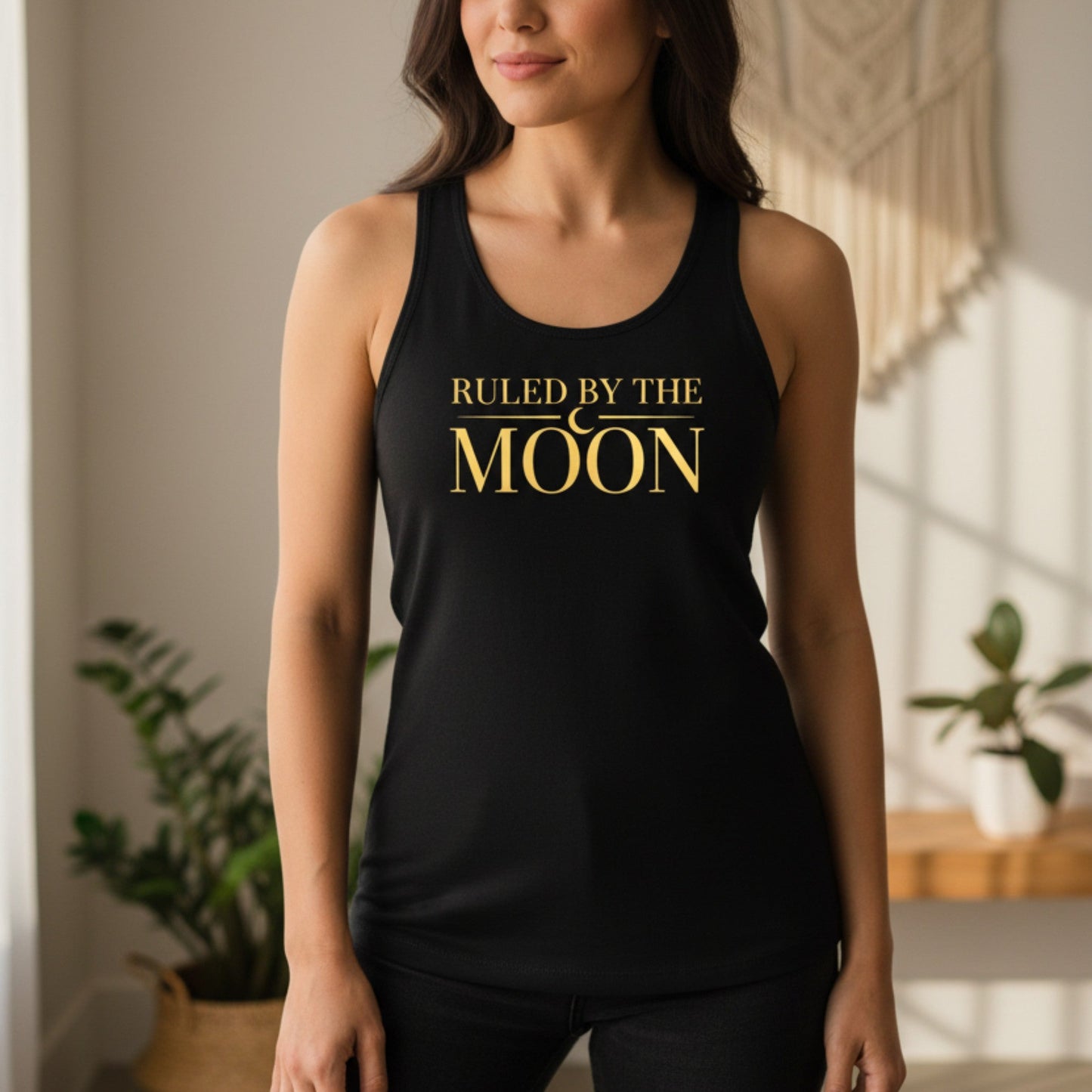 Black Ruled By The Moon racerback tank top with gold crescent moon design — spiritual gift for women who live by lunar energy