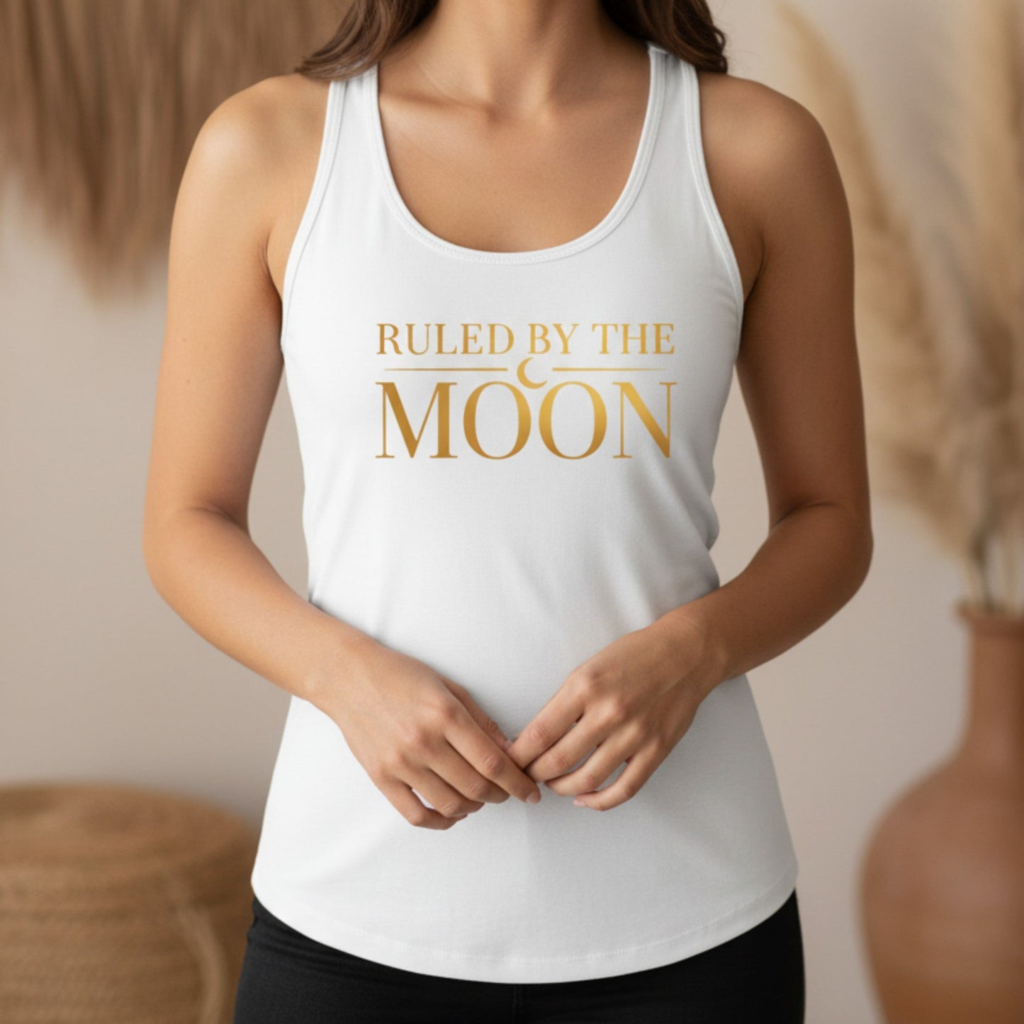 White Ruled By The Moon racerback tank top with gold moon graphic — breathable celestial tank for yoga, meditation, and everyday wear