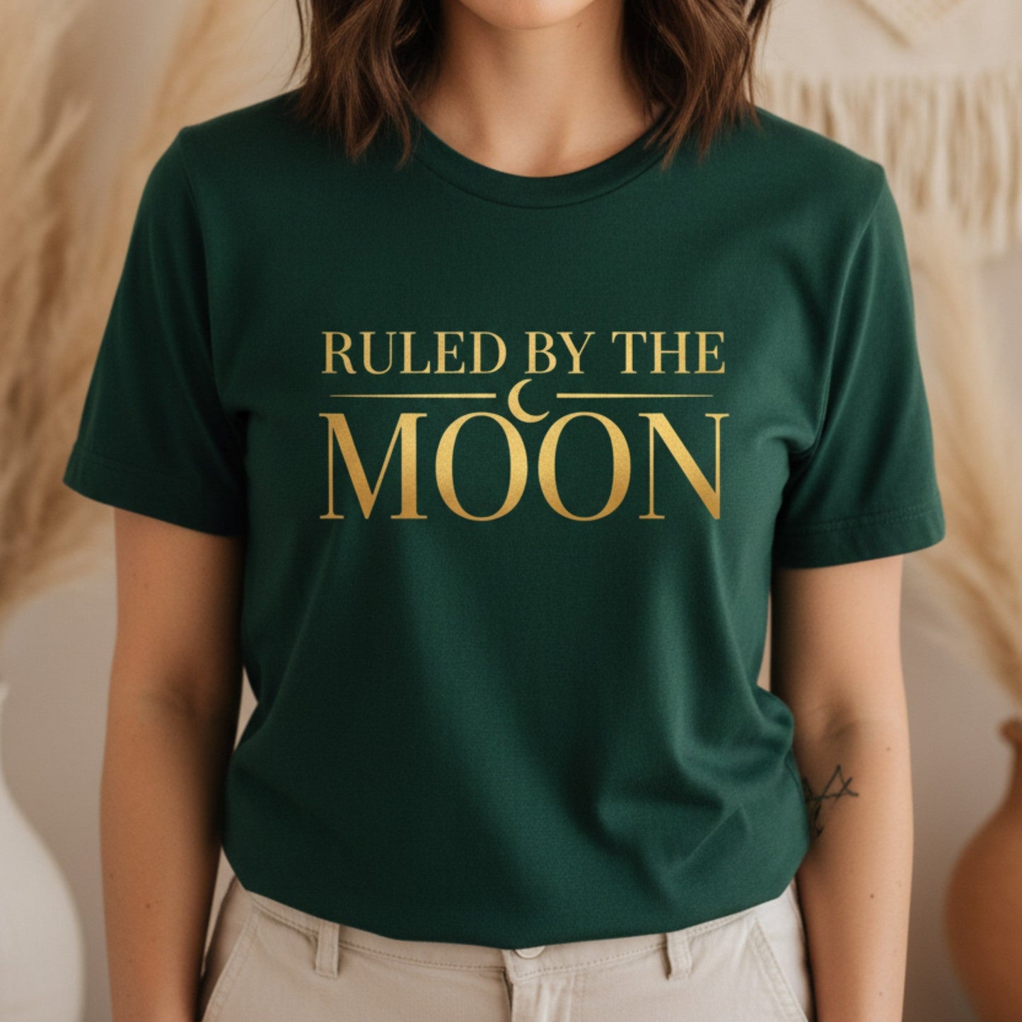Forest green earthy moon lover t-shirt with gold crescent graphic — boho spiritual tee for women drawn to nature and night sky energy
