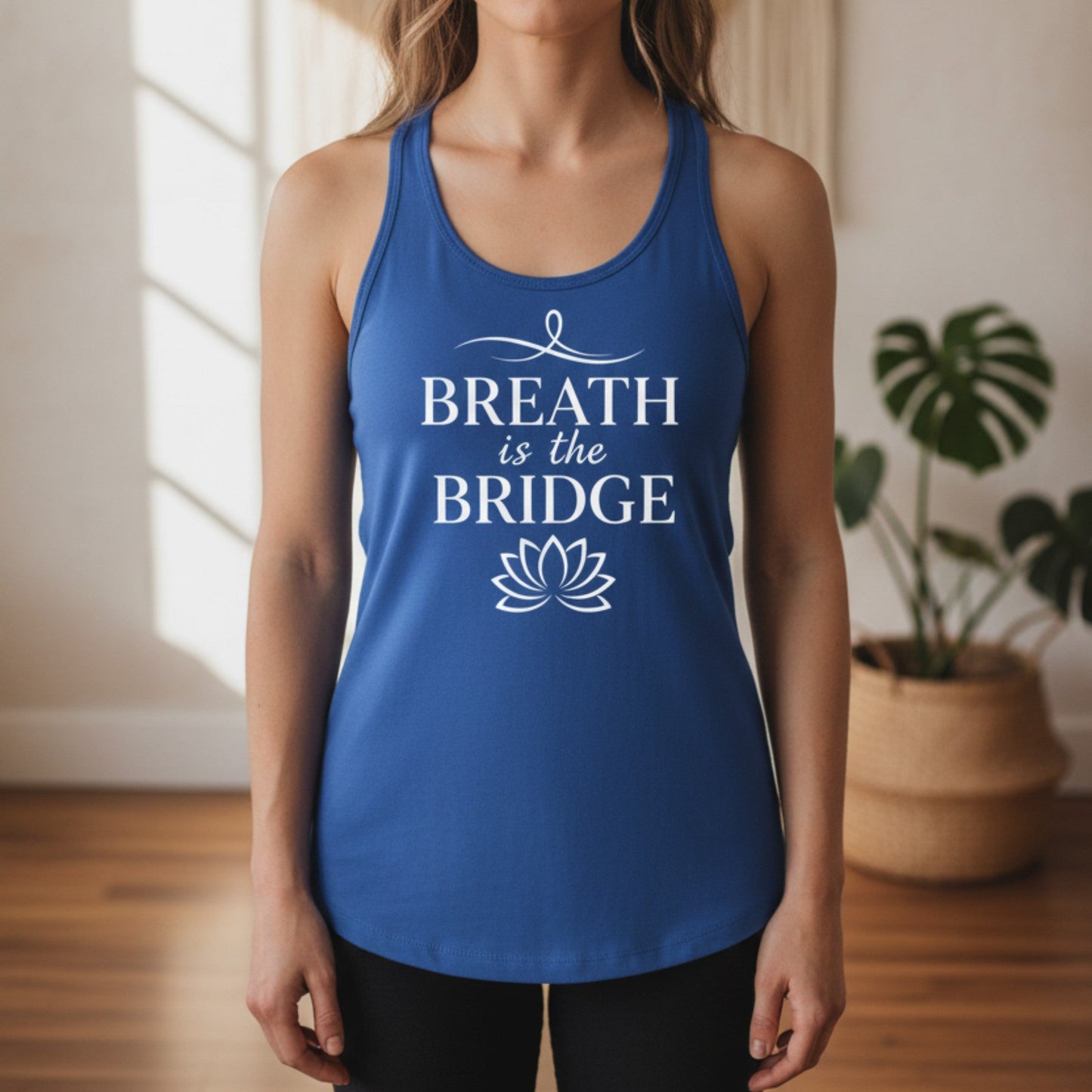 Royal blue Inhale the Future Exhale the Past racerback tank with white lotus badge design — vibrant mindfulness yoga tank for the woman who exhales the past and flows forward with intention