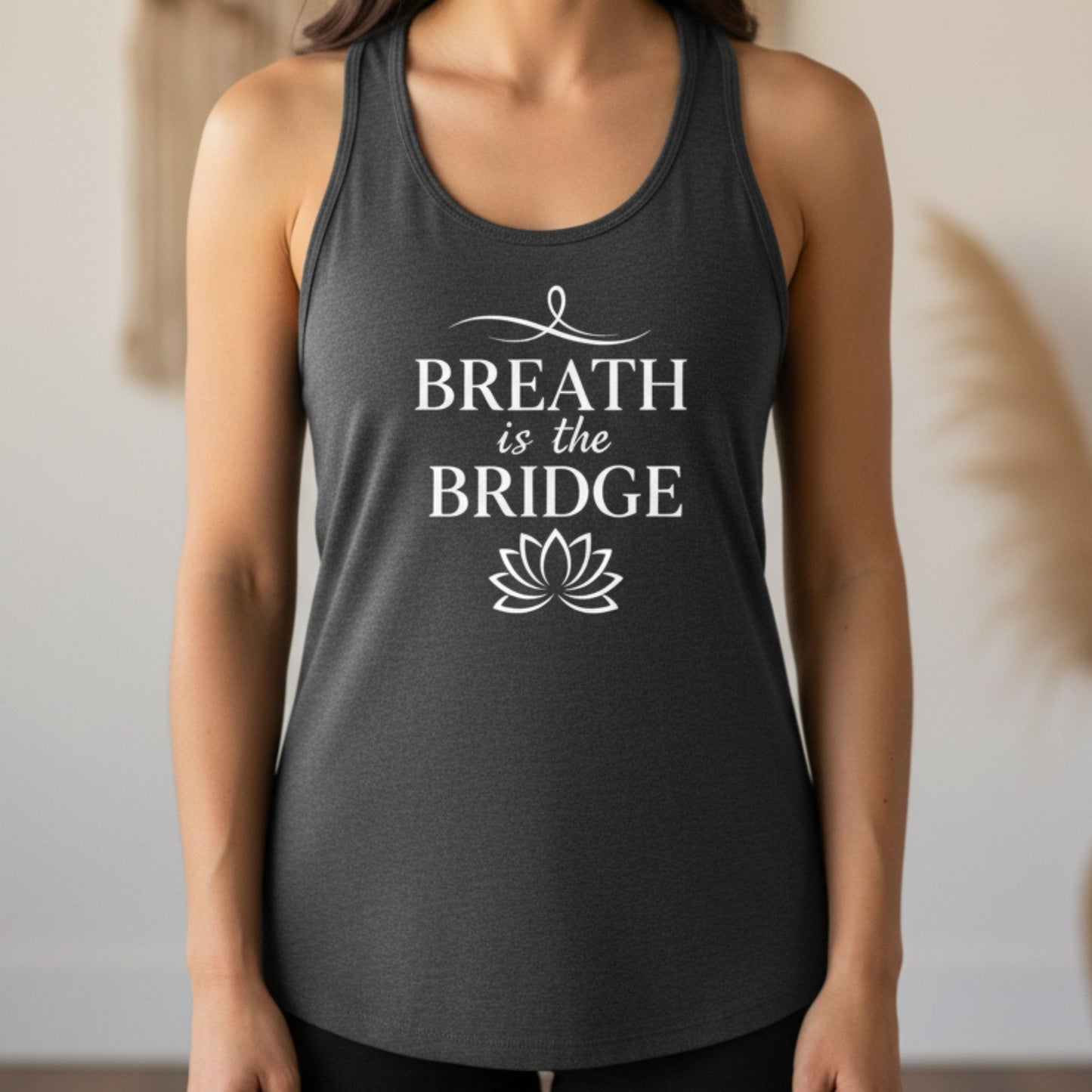 Dark gray Inhale the Future Exhale the Past racerback tank with white lotus badge print — mindfulness yoga gift for the woman who breathes forward and releases what no longer serves her