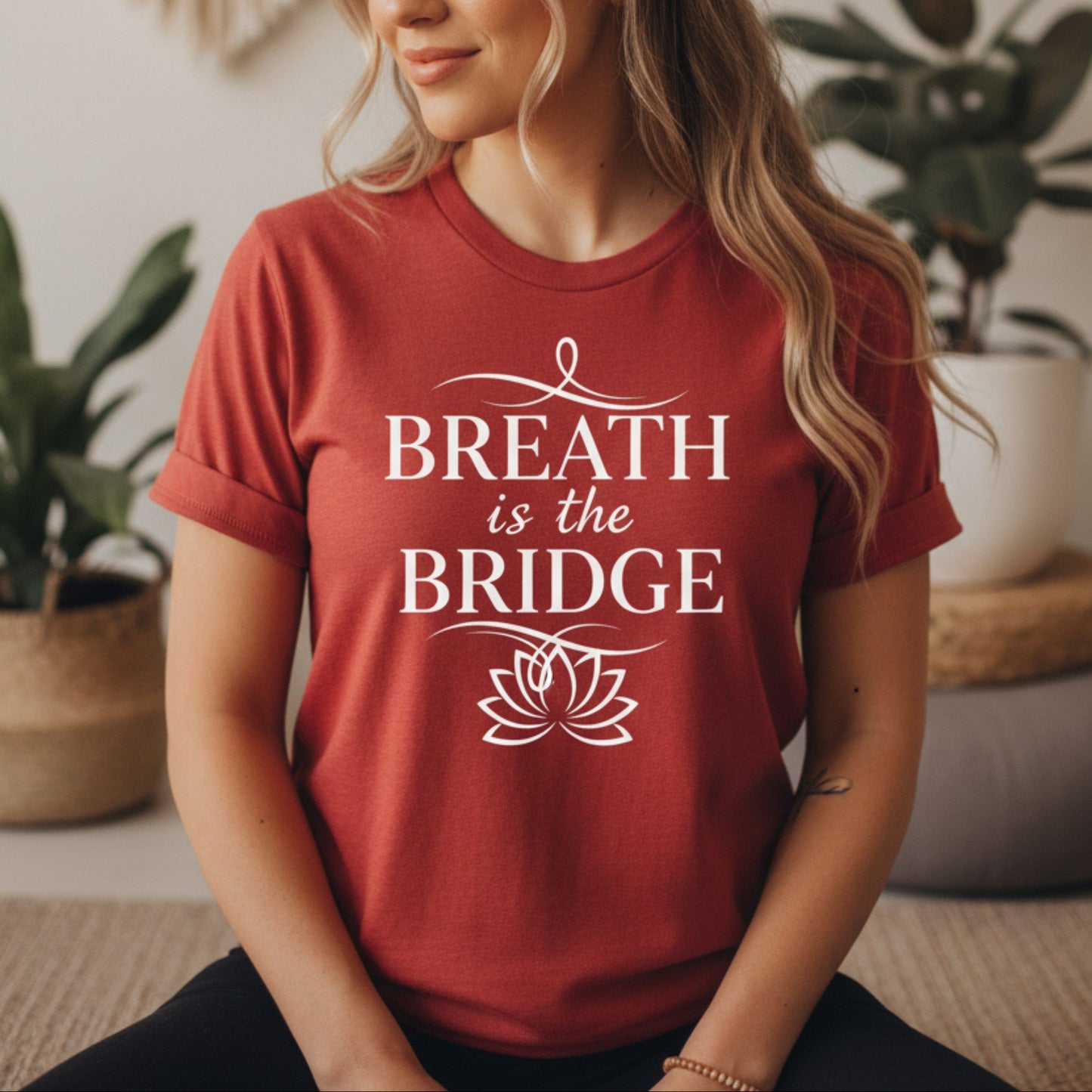 Cardinal red Breath Is The Bridge tee with white lotus and serif design — vibrant mindfulness gift for the woman who pauses, breathes, and moves forward with grace