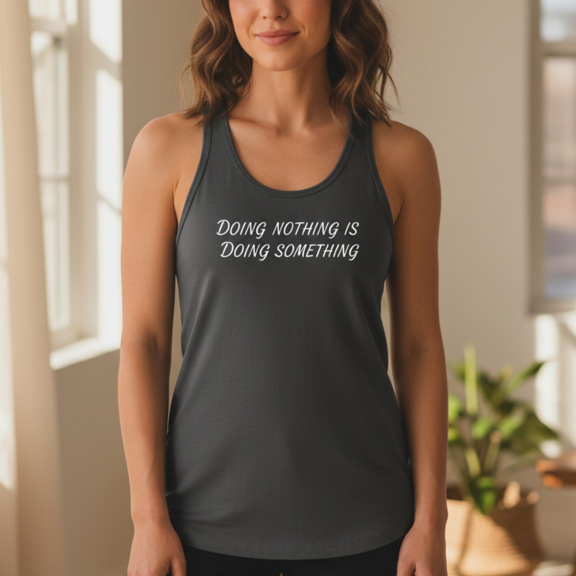 Gray racerback tank top with Doing Nothing Is Doing Something — women's self-care workout top, heat-pressed in Canada, sizes S–2XL