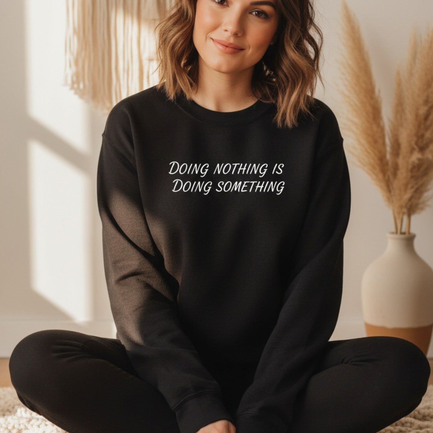 Black Doing Nothing Is Doing Something crewneck sweatshirt for women — funny self-care gift for the woman who needs a reminder that rest is productive