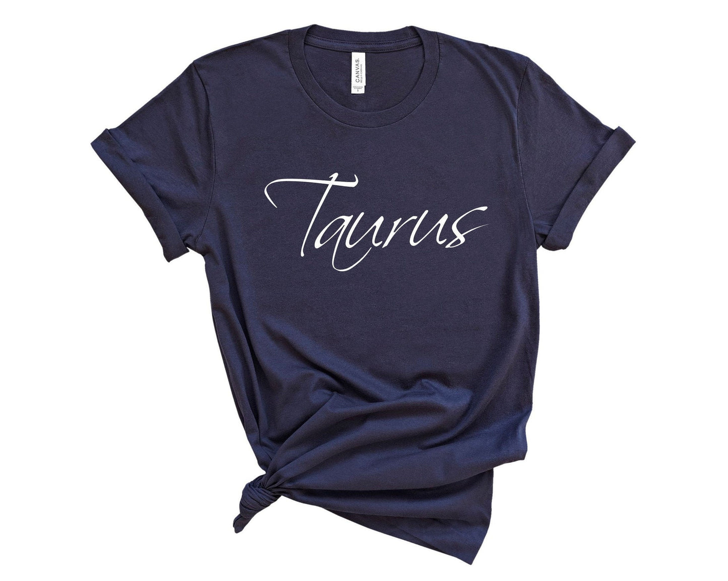 Taurus zodiac t-shirt close-up showing soft fabric and zodiac graphic detail in navy