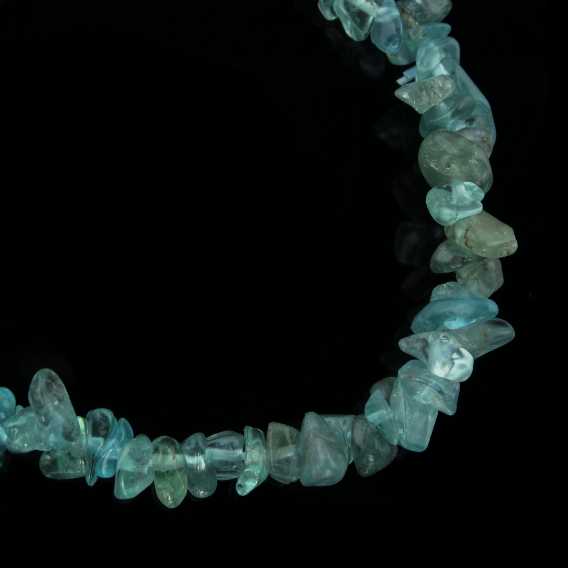 Blue apatite bead bracelet close-up showing natural stone texture