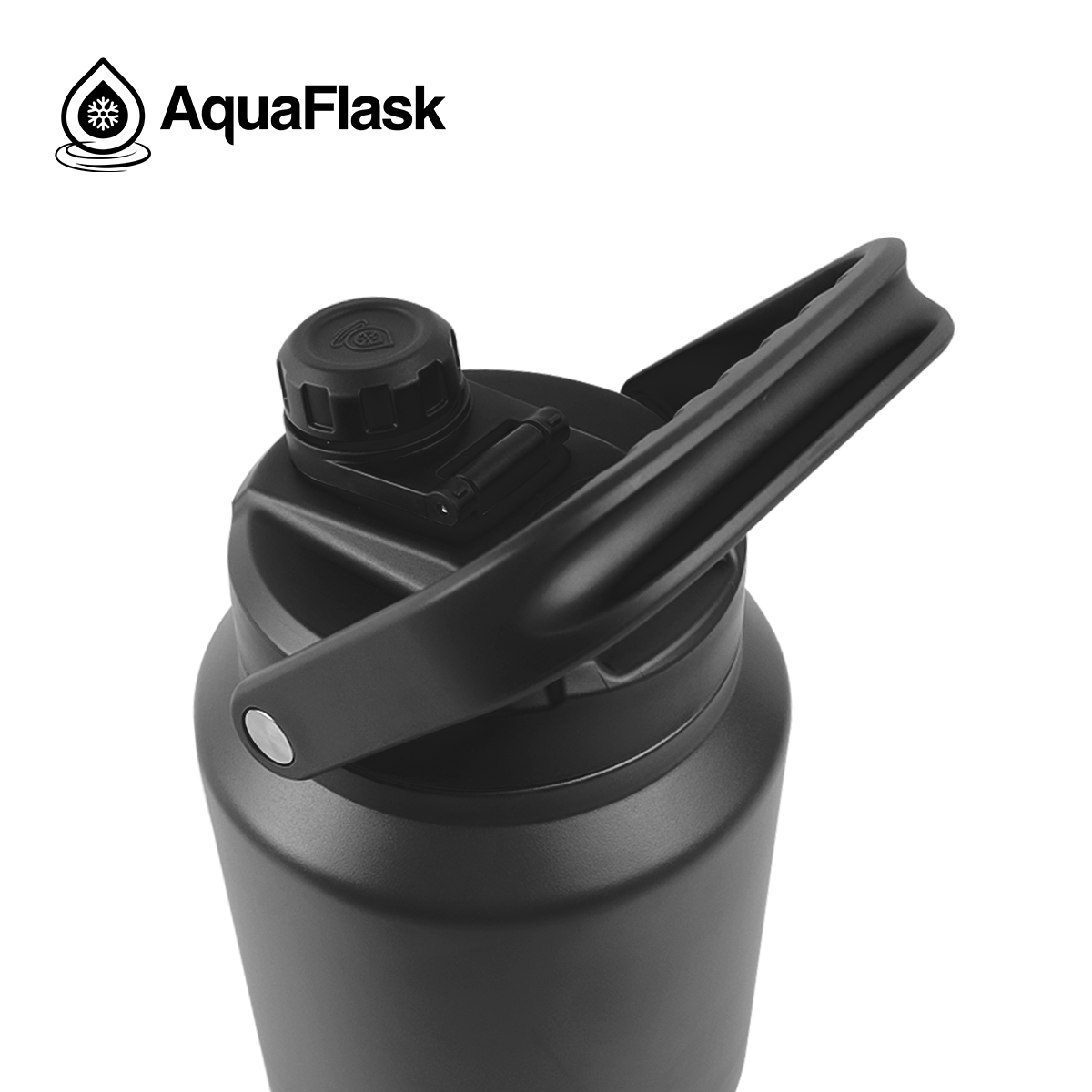 black AquaFlask Original 84oz stainless steel bottle in lifestyle setting
