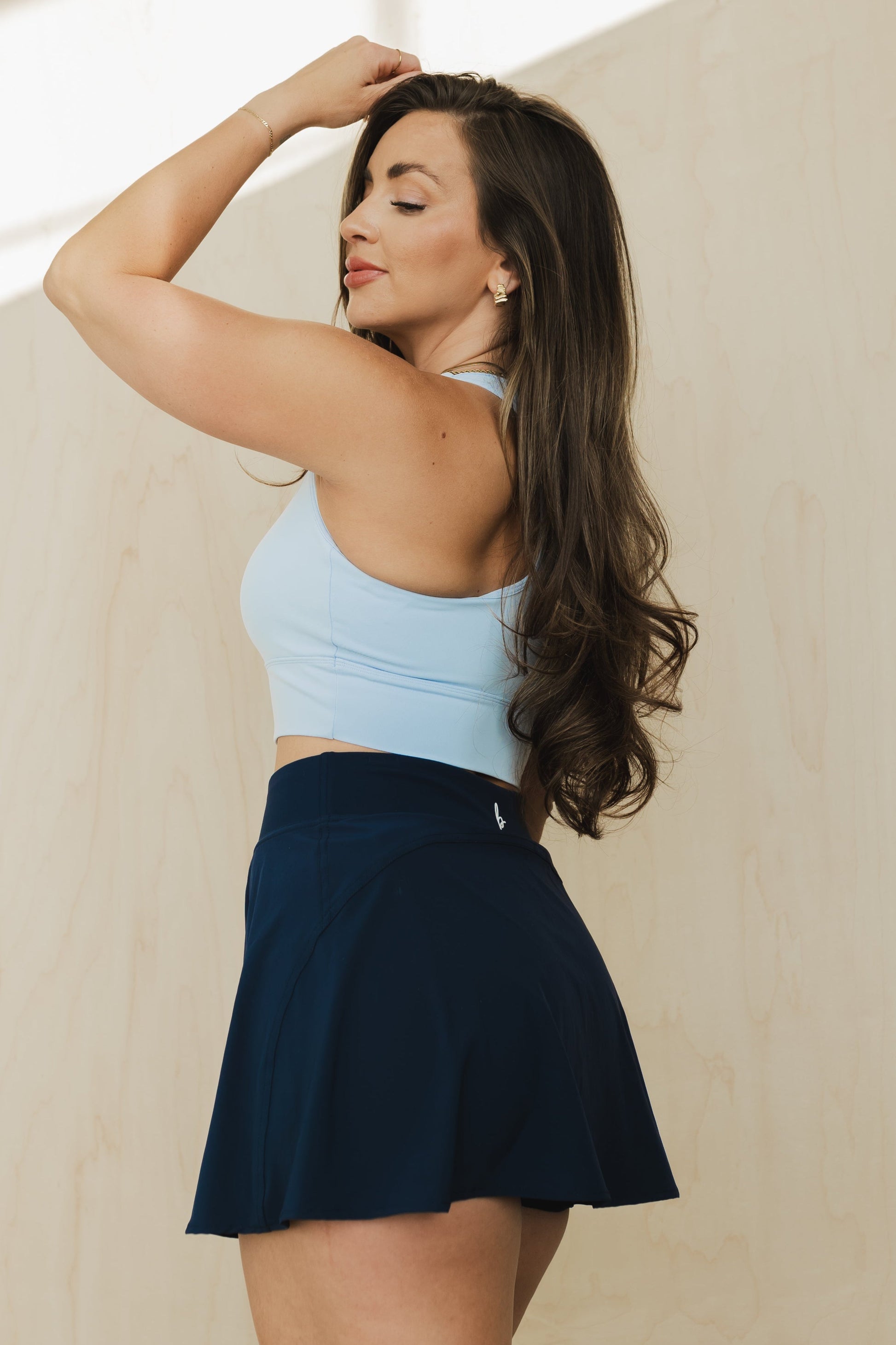 side view of racerback sports bra in heavenly blue for yoga and fitness