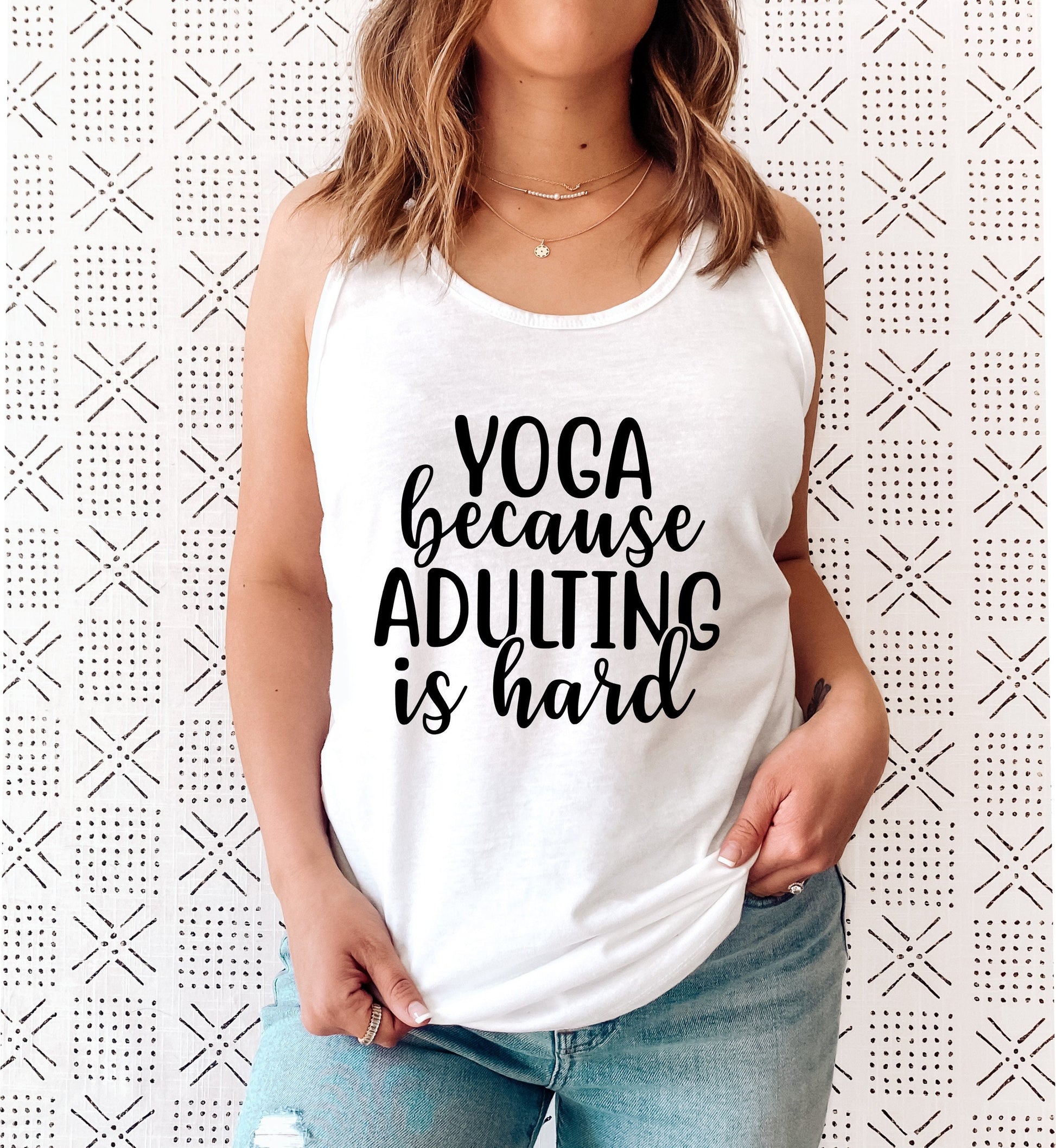 Funny "Yoga Because Adulting Is Hard" racerback tank top for relatable women in white