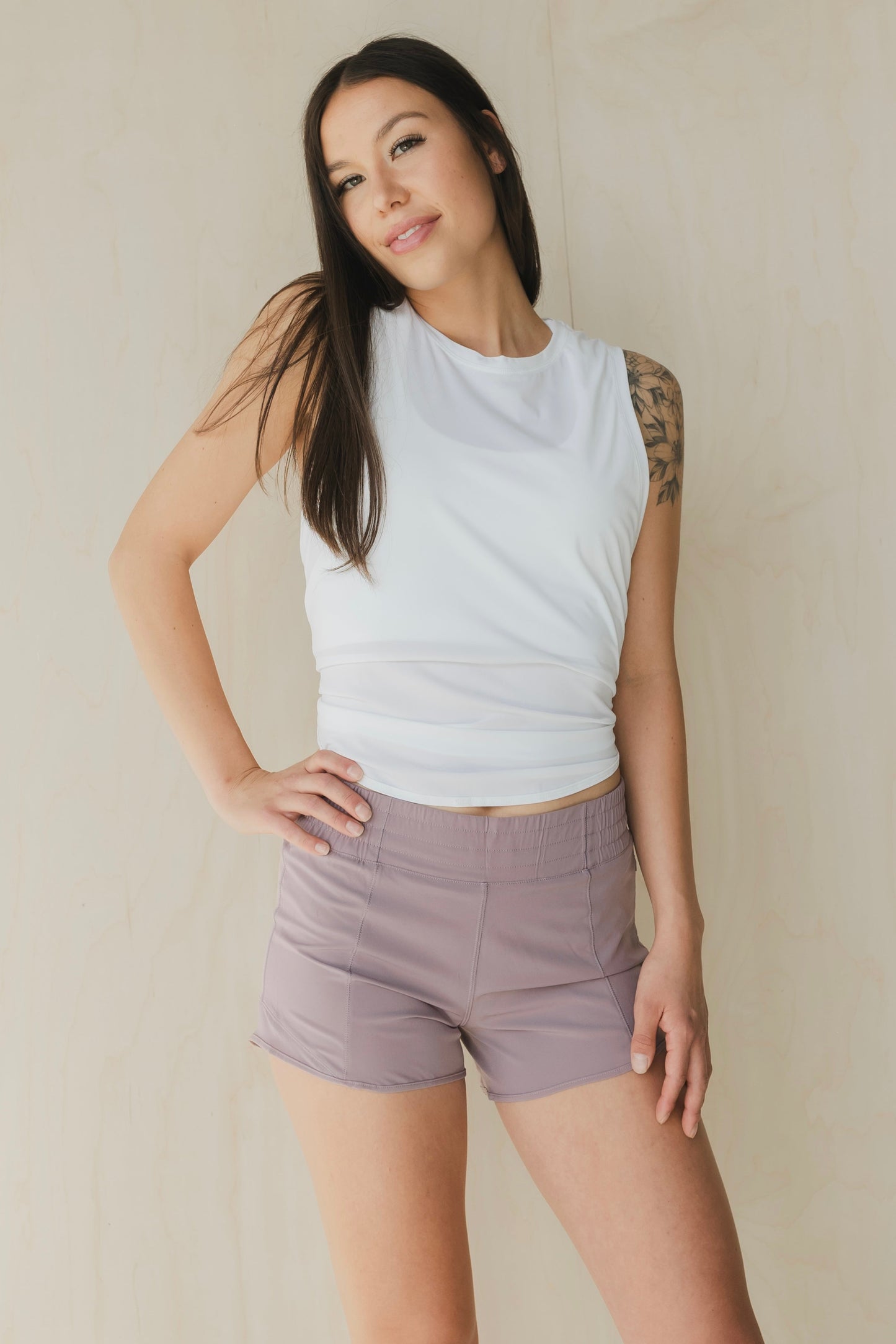 front view of woman wearing Ready for It shorts in amethyst grey for workouts and casual wear