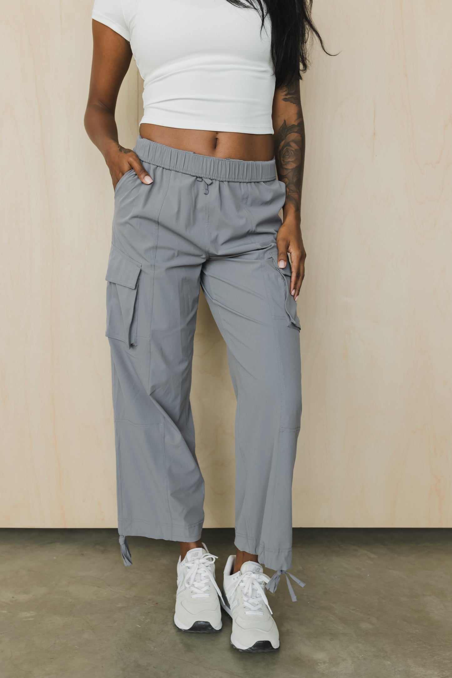 front view of a woman wearing cargo pant in grey for streetwear and casual everyday wear