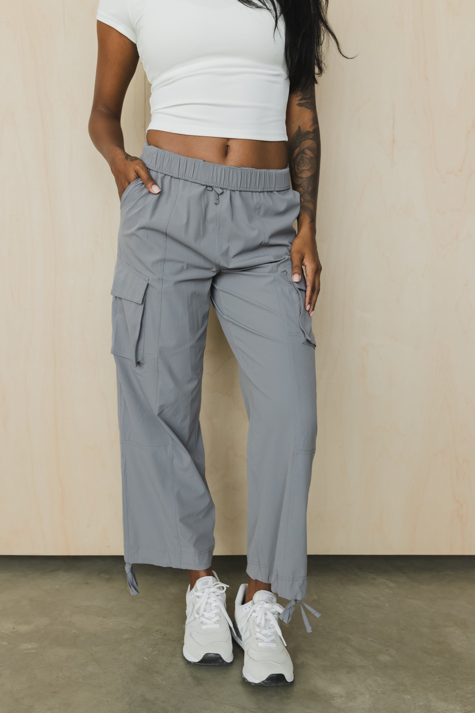 front view of a woman wearing cargo pant in grey for streetwear and casual everyday wear