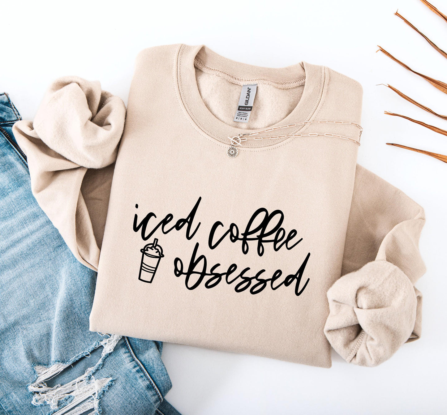 Iced Coffee Obsessed sweatshirt in soft cozy fleece for casual everyday wear on beige