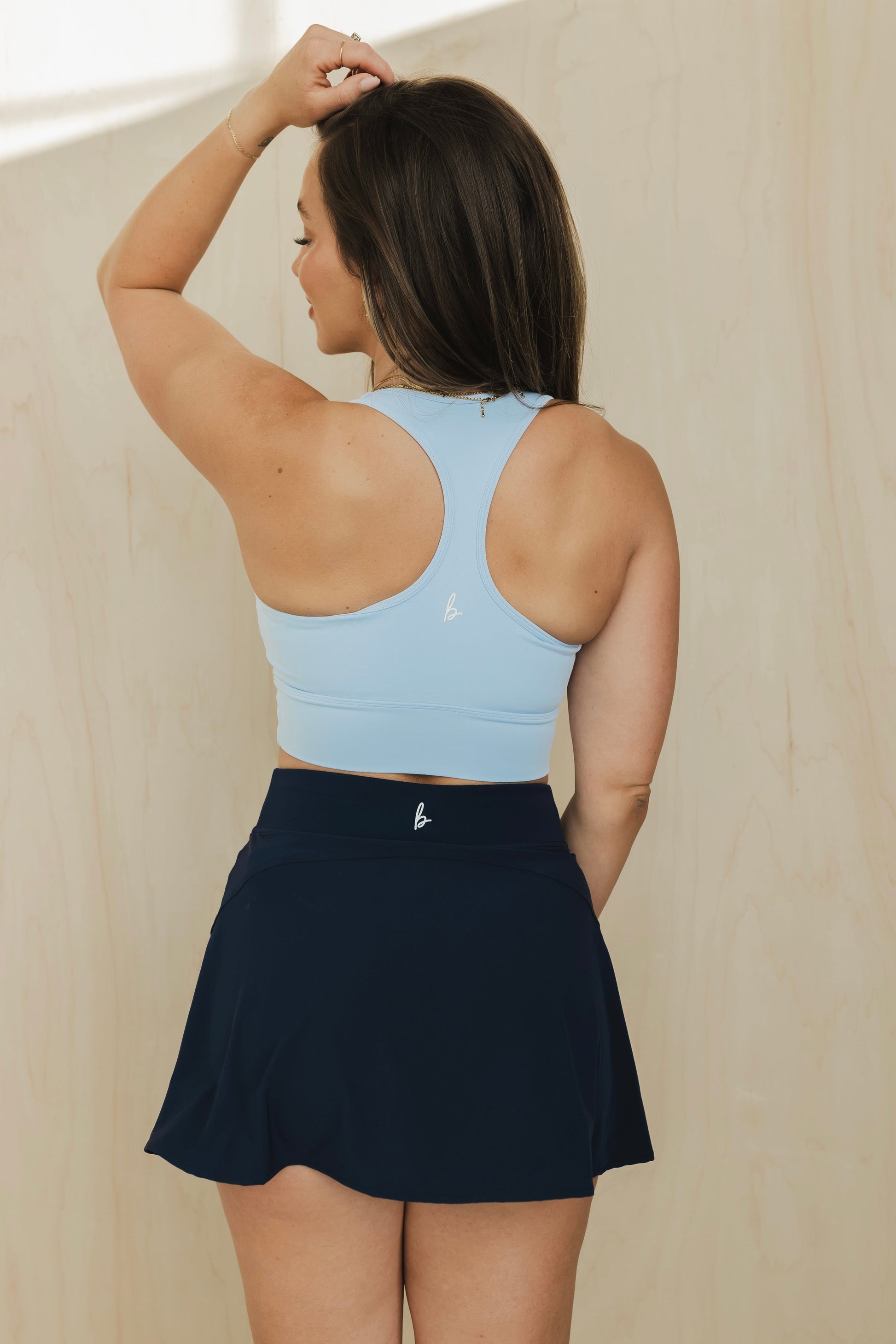 back view of racerback sports bra in heavenly blue for yoga and fitness