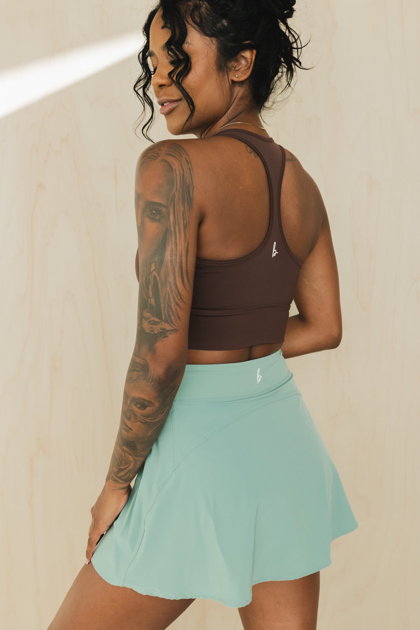 back view of racerback sports bra in americano brown for yoga and fitness