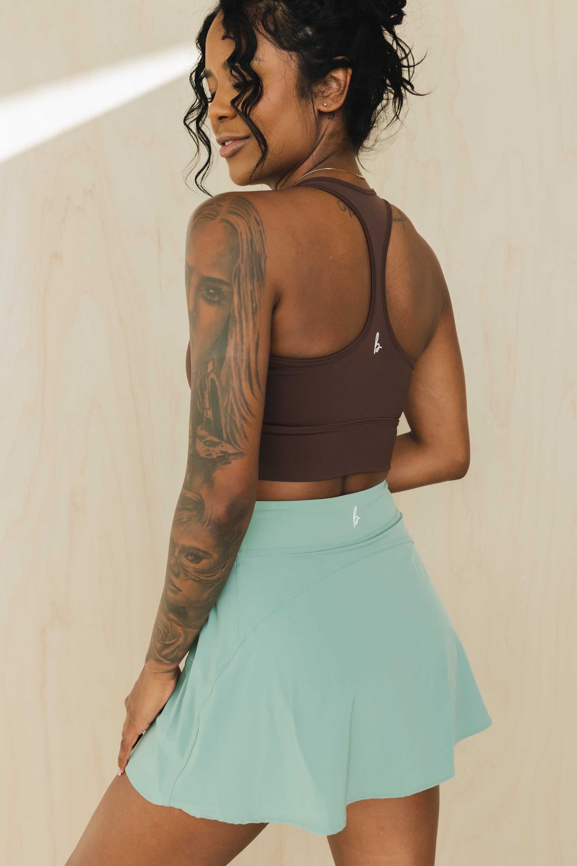 back view of racerback sports bra in americano brown for yoga and fitness