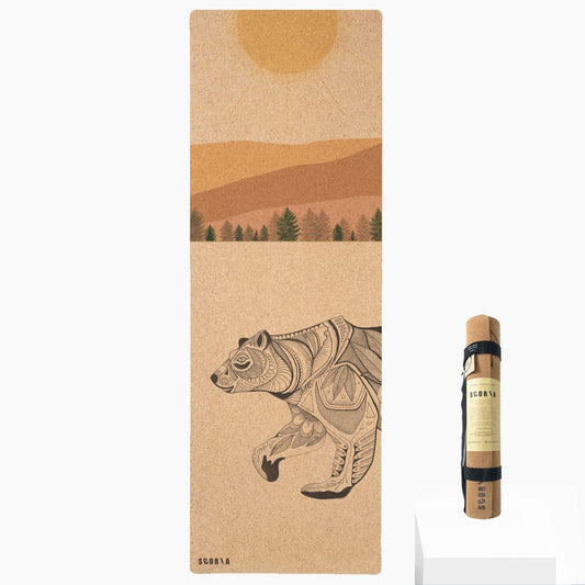 cork yoga mat with bear design and branding, shown with packaging.