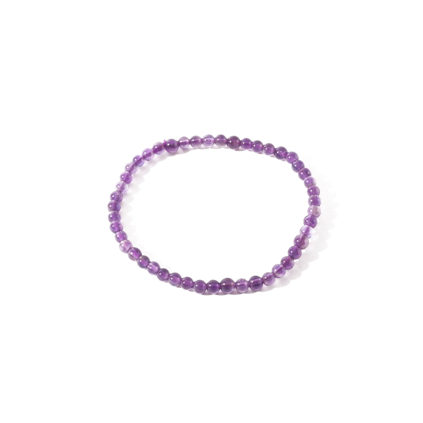 Amethyst bead bracelet close-up showing natural deep purple crystal